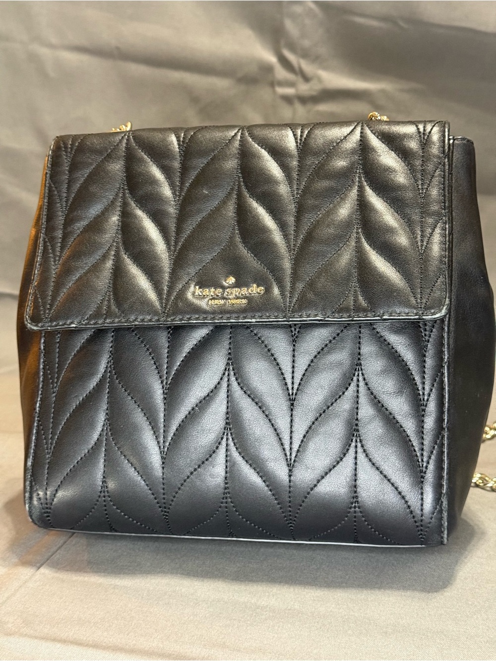 kate spade Quilted Black Leather Backpack with Gold Accents